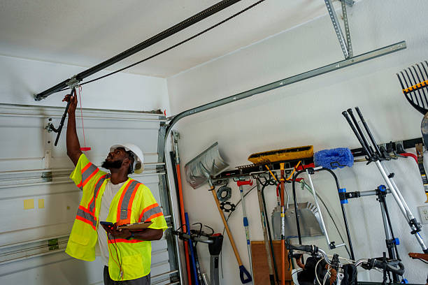 Professional Garage Door Panel Replacement technician working in Wisconsin Dells, WI